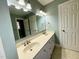 Bright bathroom featuring a double sink vanity and ample storage at 1809 Waddill Way, Henderson, NC 27536