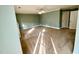 Large bedroom with neutral carpeting and ample natural light with a ceiling fan at 1809 Waddill Way, Henderson, NC 27536