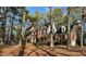 Well-maintained brick house nestled among mature trees on a spacious lot at 1809 Waddill Way, Henderson, NC 27536