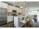 Bright kitchen with stainless steel appliances, white cabinets, and a marble island with seating at 2317 Bay Minette Station Sta # 545, Apex, NC 27502
