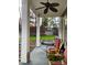 Comfortable back porch with a hanging chair and rocking chairs offering a relaxing outdoor retreat at 3104 Sandy Knoll Ln, Knightdale, NC 27545