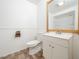 Bathroom featuring a toilet and vanity with a mirror at 3104 Sandy Knoll Ln, Knightdale, NC 27545