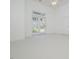 Bright living room featuring a patio access and bright light at 3104 Sandy Knoll Ln, Knightdale, NC 27545