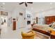 Main bedroom features a fireplace, a ceiling fan, and access to an outdoor area at 3104 Sandy Knoll Ln, Knightdale, NC 27545