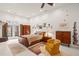 Spacious main bedroom features a ceiling fan, sitting area, and French doors at 3104 Sandy Knoll Ln, Knightdale, NC 27545