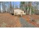 Charming shed with stairs on a wooded lot at 3104 Sandy Knoll Ln, Knightdale, NC 27545