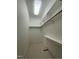 Organized walk-in closet with shelving and racks for ample storage at 3104 Sandy Knoll Ln, Knightdale, NC 27545