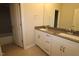 Elegant bathroom featuring double sinks, quartz countertops, and modern fixtures with a tub and shower combination at 3195 Mission Olive Pl # 352, New Hill, NC 27562