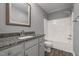Bathroom featuring granite countertop and shower/tub combo at 35 Henry Rifle Ln, Angier, NC 27501