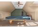 Large game room with pool table, ceiling fan, and unique architecture at 35 Henry Rifle Ln, Angier, NC 27501
