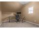 Home office with tan carpet, desk, and lots of natural light at 35 Henry Rifle Ln, Angier, NC 27501
