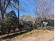 Home with a mailbox, driveway and trees around the home at 3501 Turnbridge Dr, Raleigh, NC 27609