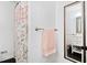 Bathroom with a shower featuring a floral curtain, a framed mirror, and a vanity at 3716 Yorktown Pl, Raleigh, NC 27609