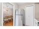 Bright kitchen featuring stainless steel appliances, granite countertops, and a view into the dining area at 3716 Yorktown Pl, Raleigh, NC 27609