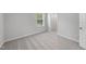 Bedroom featuring carpeted floors, natural lighting, and a large window with blinds at 376 Buckhorn Branch Park # 38, Clayton, NC 27520