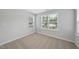 Bright bedroom featuring natural light and cozy carpet at 376 Buckhorn Branch Park # 38, Clayton, NC 27520