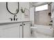 Stylish bathroom with a sleek vanity, modern fixtures, and a shower-tub combination with tiled walls at 3812 Cobbler View Way, Fuquay Varina, NC 27526