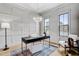 Office featuring panelled walls, stylish lighting, and natural light from two windows at 3812 Cobbler View Way, Fuquay Varina, NC 27526