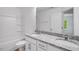 Bright bathroom showcases a granite countertop, double sinks, toilet, and a shower-tub combination at 427 Rowe Way, Knightdale, NC 27545