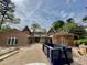 Under construction, this large brick home features multiple gables and a new roof at 4305 Windsor Pl, Raleigh, NC 27609