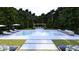 A lavish rectangular pool with a spa, lounge chairs, pergola, and meticulous landscaping at 4305 Windsor Pl, Raleigh, NC 27609
