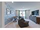 Stylish game room featuring a foosball table, comfortable beanbag chairs, and modern decor at 615 Contento Ct, Sanford, NC 27330