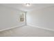 Cozy bedroom featuring neutral carpet, fresh paint and a window providing natural light at 617 Spellbrook Rd, Zebulon, NC 27597