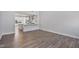 Open floor plan featuring hardwood floors and views of the kitchen and dining area at 617 Spellbrook Rd, Zebulon, NC 27597
