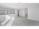 Spacious loft area with carpet, white walls, and natural light at 617 Spellbrook Rd, Zebulon, NC 27597