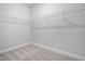 Walk-in closet with carpet and wire shelving at 617 Spellbrook Rd, Zebulon, NC 27597