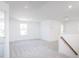 Spacious bonus room with neutral carpet, bright lighting and natural light from windows at 619 Contento Ct, Sanford, NC 27330