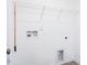 Laundry room with hookups and wire rack shelving at 619 Contento Ct, Sanford, NC 27330