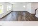 Spacious living room filled with natural light and hardwood floors at 619 Contento Ct, Sanford, NC 27330