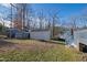 Back yard shot shows a storage shed and deck of house at 6309 Charmco Ct, Wake Forest, NC 27587