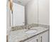 Bathroom features granite countertops, a modern faucet, and a large mirror at 6309 Charmco Ct, Wake Forest, NC 27587