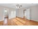 Bedroom with hardwood floors and multiple entrances for convenience and flow at 6309 Charmco Ct, Wake Forest, NC 27587