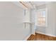 Walk in closet featuring wood shelving and a window for natural light at 6309 Charmco Ct, Wake Forest, NC 27587