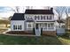 Charming two-story home with a well-maintained lawn and classic architectural details at 6309 Charmco Ct, Wake Forest, NC 27587
