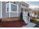 View of the bay window and porch entrance, leading to the charming home's facade at 6309 Charmco Ct, Wake Forest, NC 27587