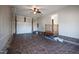 Spacious garage features tile flooring and a wooden porch at entry point at 6309 Charmco Ct, Wake Forest, NC 27587