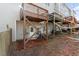 Townhouse featuring a back deck overlooking a partially wooded backyard at 650 Ganyard Farm Way # 13, Durham, NC 27703