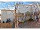 Backyard of a townhouse with decks overlooking natural surroundings at 650 Ganyard Farm Way # 13, Durham, NC 27703