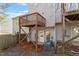View of deck and ground floor access from townhouse backyard at 650 Ganyard Farm Way # 13, Durham, NC 27703