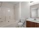 Bright bathroom with a tub/shower combo and modern vanity at 650 Ganyard Farm Way # 13, Durham, NC 27703