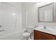 Well-maintained bathroom featuring a tub and shower combo with a wooden vanity at 650 Ganyard Farm Way # 13, Durham, NC 27703