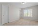 Bedroom with a large window letting in lots of natural light at 650 Ganyard Farm Way # 13, Durham, NC 27703