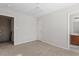 Bedroom with plush carpet flooring and neutral decor at 650 Ganyard Farm Way # 13, Durham, NC 27703