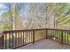 View from a wooden deck surrounded by trees at 650 Ganyard Farm Way # 13, Durham, NC 27703