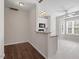 Modern kitchen with breakfast bar, white cabinets and stainless steel appliances at 650 Ganyard Farm Way # 13, Durham, NC 27703