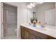 Bathroom featuring double sinks, neutral walls, and a shower-tub combination at 68 Victory View Ter, Smithfield, NC 27577